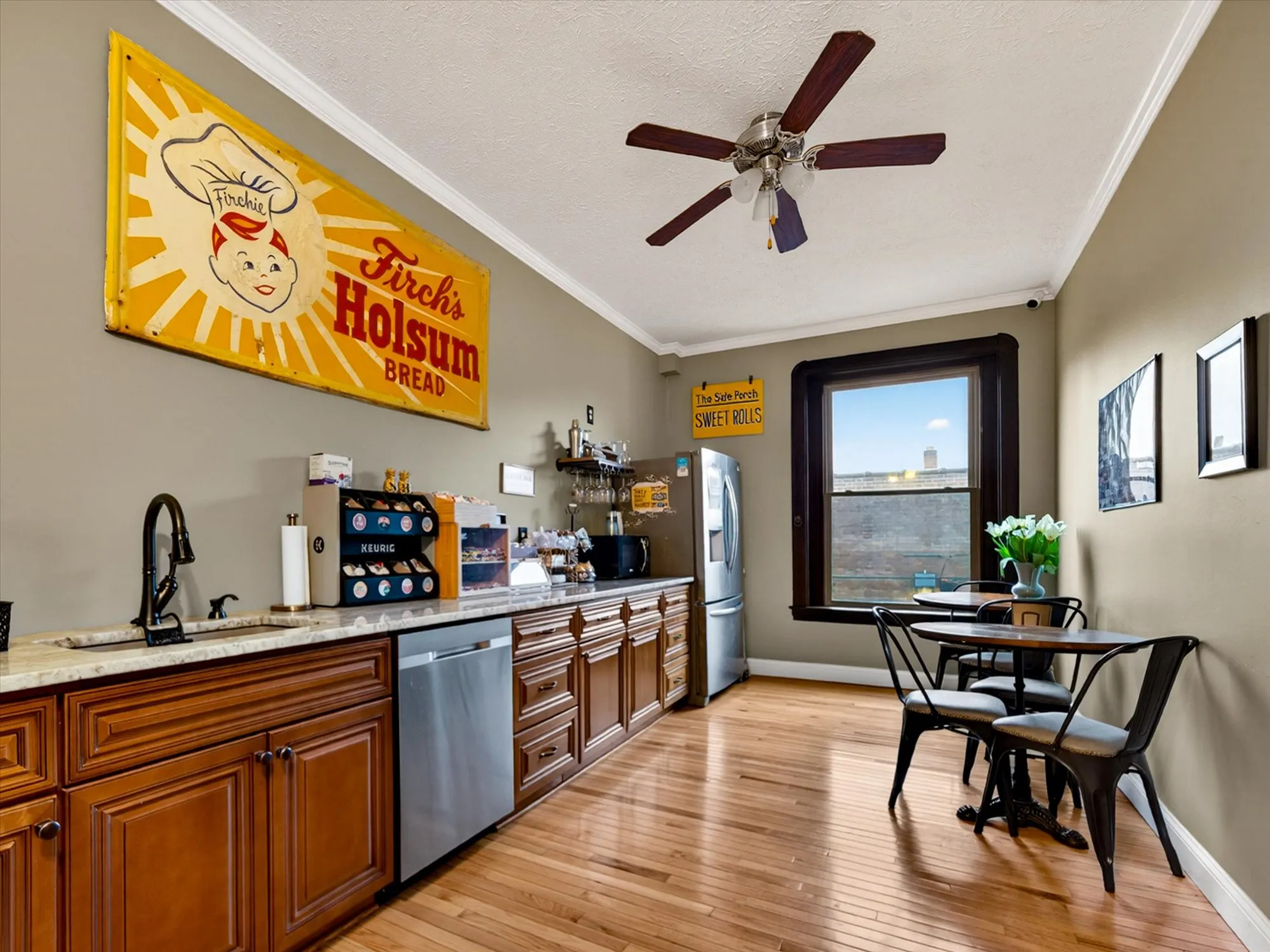 The Naples Hotel breakfast room — coffee station and bistro seating