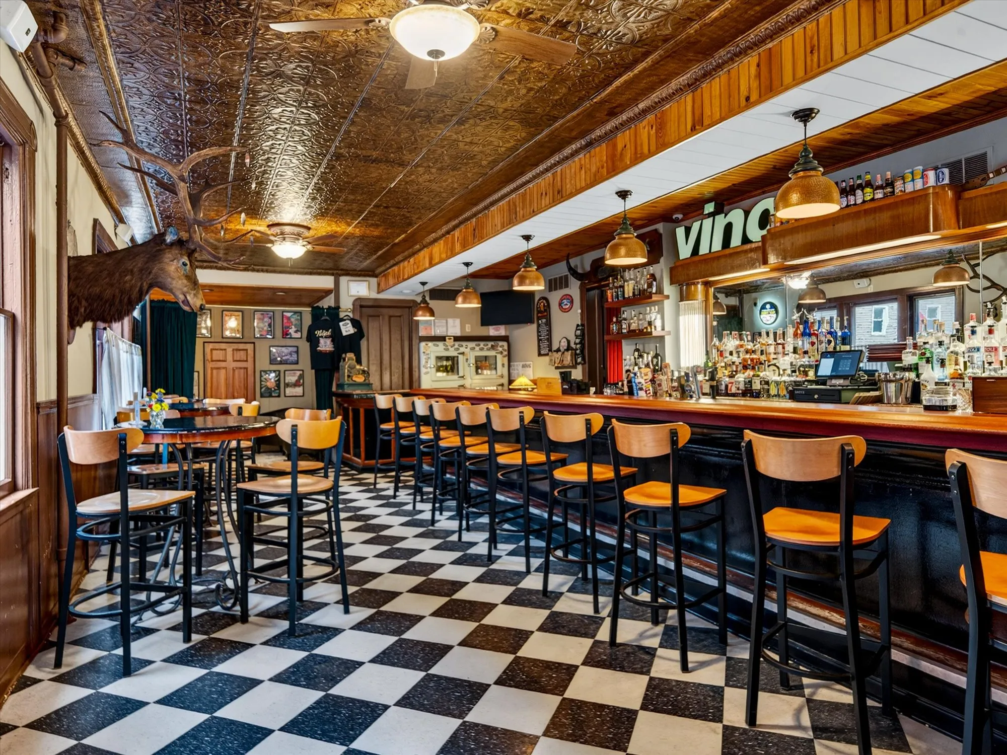 The Naples Hotel Tap Room bar, looking down the rail